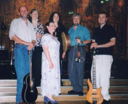 ceilidh band posing on steps