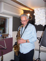 The AJ Jazz Band Jazz band saxophonist in a recording studio.  This band perform for corporate event