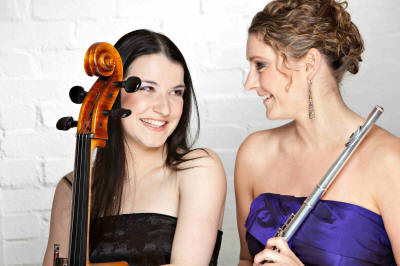The AC Flute & Cello Duo Smiling happy Duo who play cello and flute in London and Middlesex