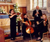 string quartet in front of altar